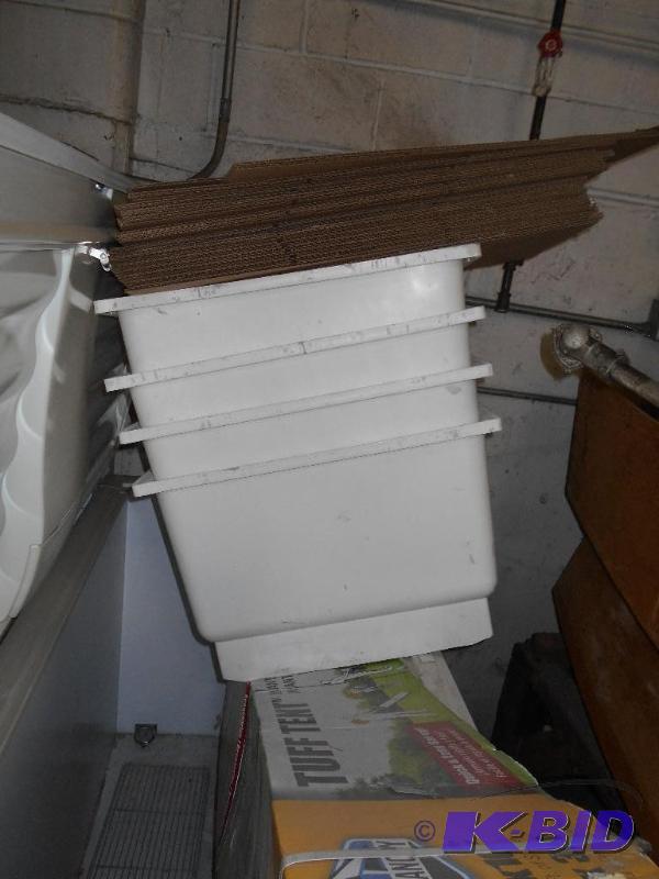 4 Utility Tubs. Legs are in the Tubs.