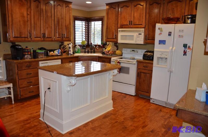lot 118 image: Granite top kitchen Island 36x48" has el...