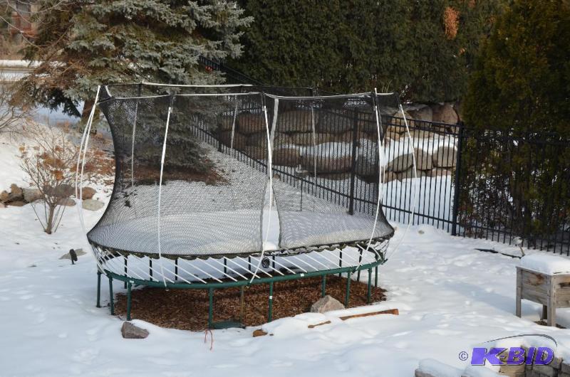 lot 176 image: Trampoline- may be frozen to ground so bring ...