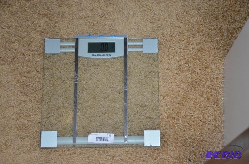 lot 219 image: Square Glass bathroom scale may have body fat...