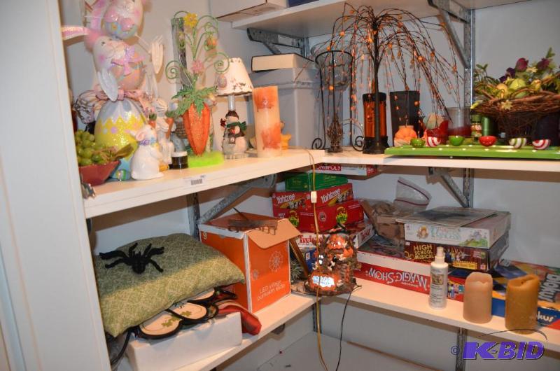 lot 256 image: Shelves of holiday decor as pictured...