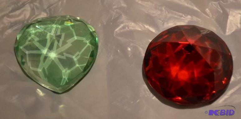 lot 261 image: 2 colored jems 1.5" in diameter...