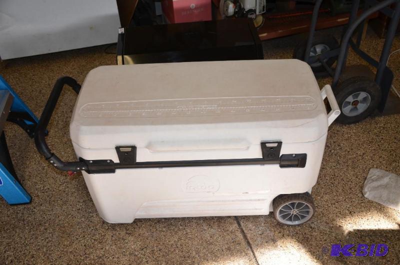 lot 312 image: Large white cooler on wheels 36" long...