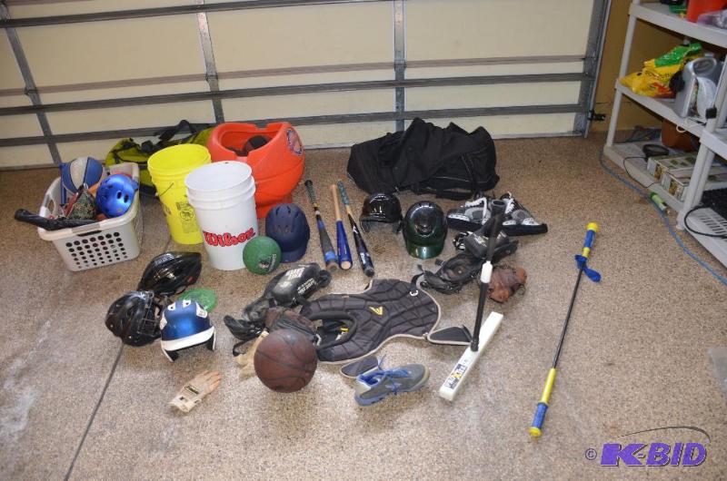 lot 327 image: Sports equipment - batting helments, bats, ba...