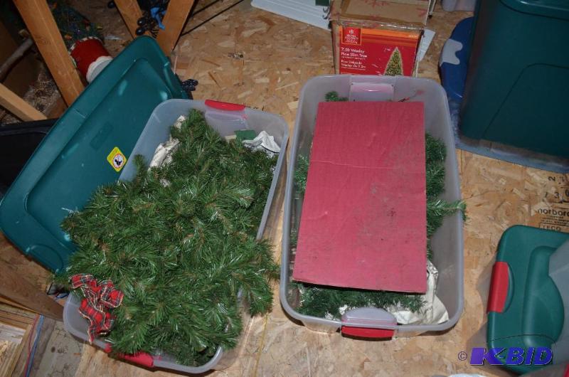 lot 333 image: Multiple bins of Christmas decor - trees, tre...