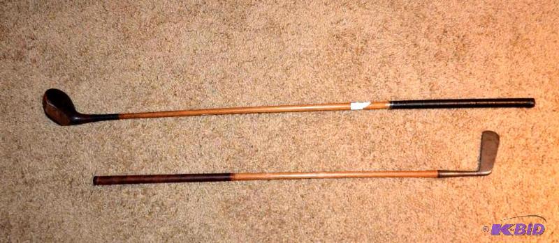 lot 34 image: Antique golf driver & Robroy putter...