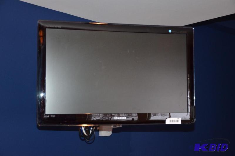 lot 60 image: Samsung model P2770HD TV & wall bracket, ...