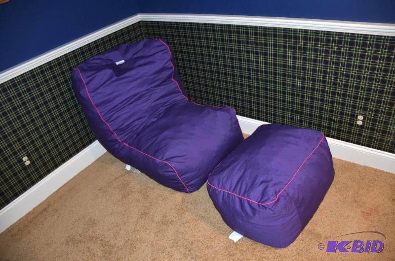 lot 64 image: purple chair & ottoman...