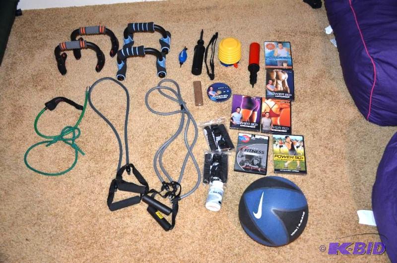 lot 66 image: Sports fitness training gear - 7 DVDs, 10 pou...