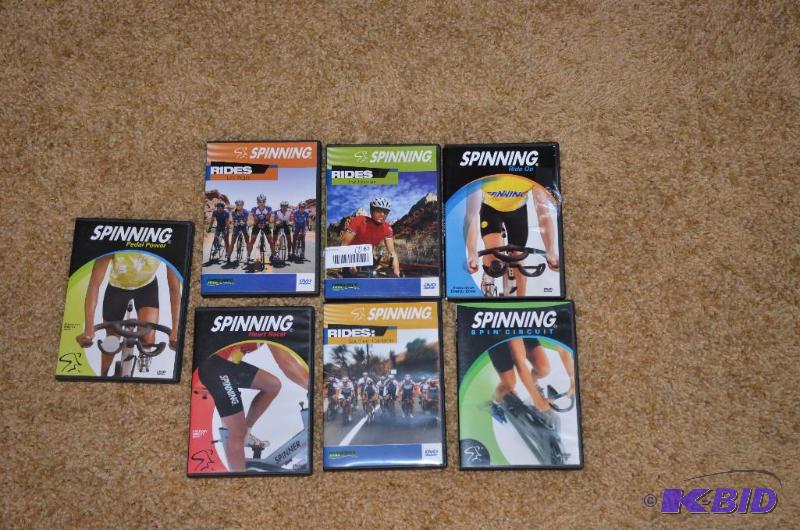 lot 67 image: 7 Bike Spinning DVDs...