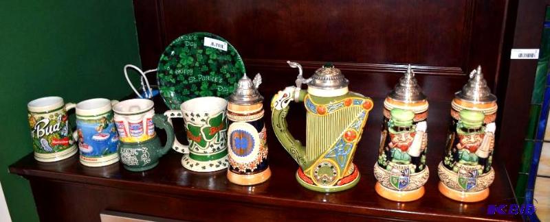 lot 9 image: 8 Beer Steins & one St Patrick Day plate...