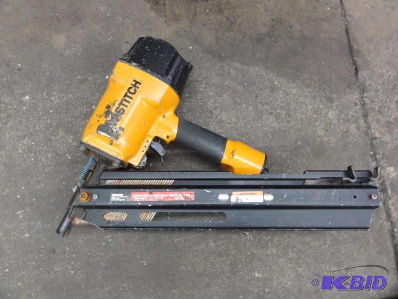 lot 1217 image: Bostitch Pneumatic Strip Nailer...