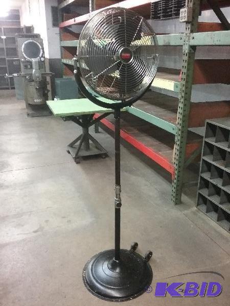 lot 28 image: 16" diameter floor fan on adjustable hei...