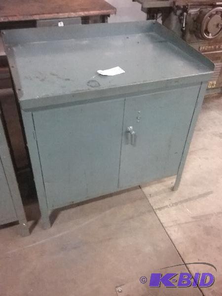 lot 31 image: 2-door cabinet 24" x 36" x 34"...