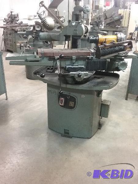 lot 35 image: Ward Helix Grinder. Swiveling work table and ...