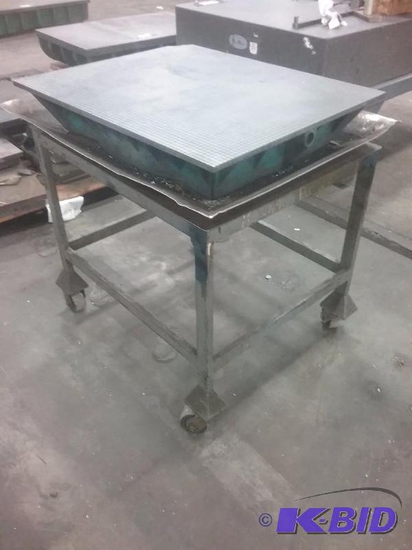lot 573 image: Cast iron lapping plate, on rolling steel sta...
