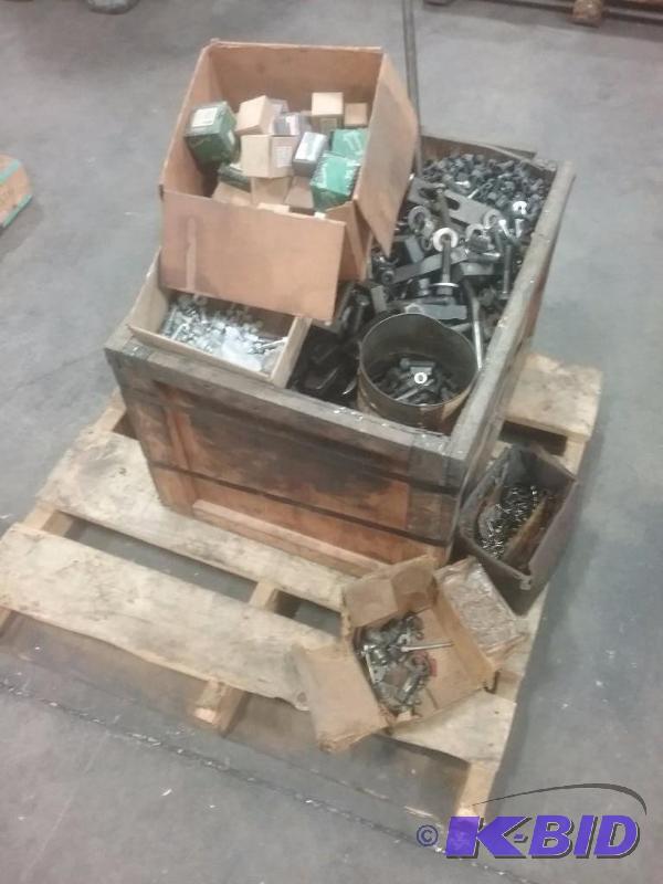 lot 586 image: Pallet with box of hold downs, bolts, etc.   ...