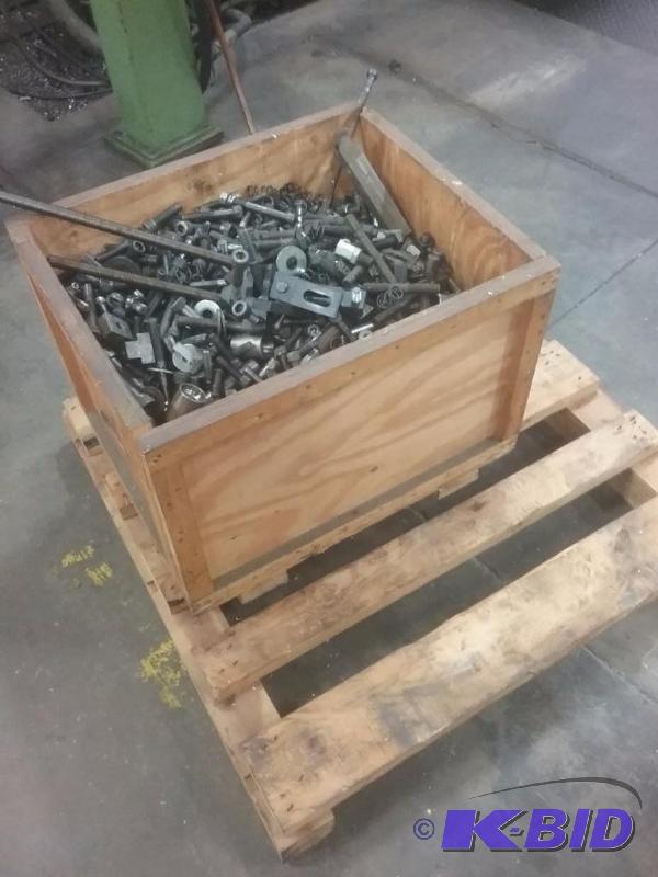 lot 588 image: Pallet with box of hold downs, bolts, etc.   ...