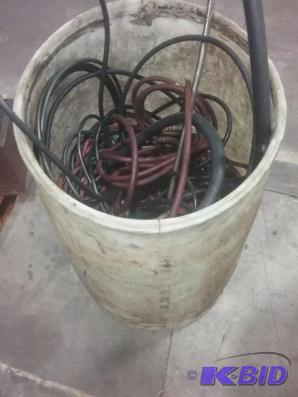 lot 656 image: Plastic barrel with air hoses...