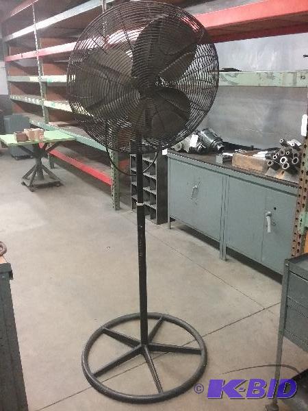 lot 8 image: 24" diameter floor fan on adjustable hei...