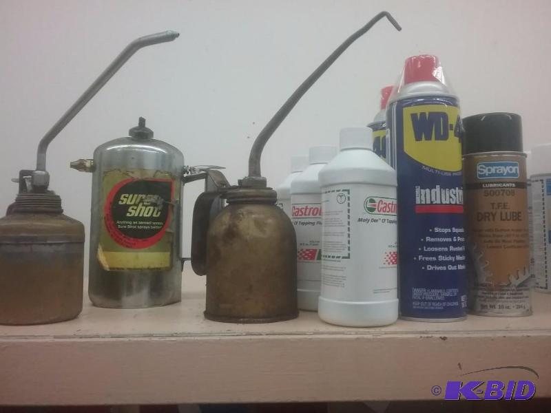 lot 811 image: (2) oil cans, (1) Sure Shot sprayer, (3) bott...