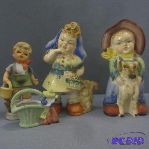 lot 19 image: Boy & Girl Figurines