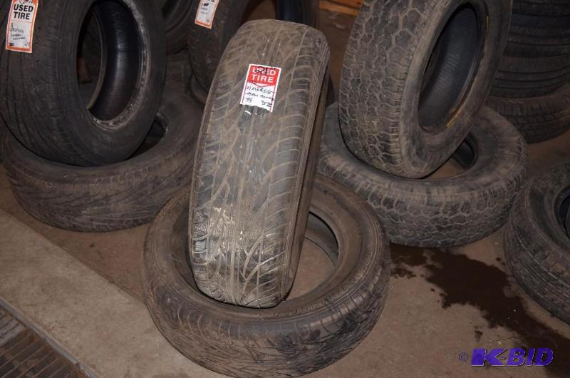 lot 21 image: 2 Aspen touring 2156515 Tires. Bidders resp...