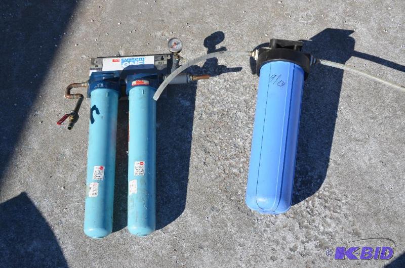 lot 18 image: 3 large commercial water filters 24" tal...