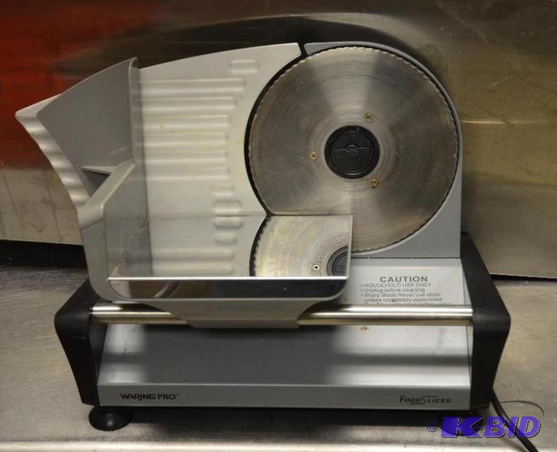 lot 54 image: Waring Pro food slicer model FS150, powers up...