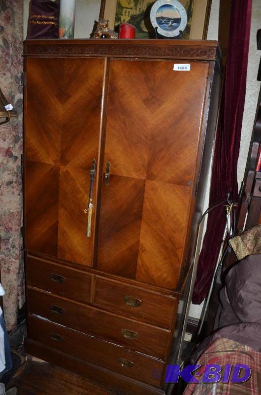 lot 15 image: Wood armoire 36x24x75", it has a bar for...