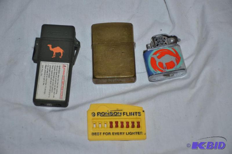 lot 164 image: Zippo Marlborough lighter, 2 Camel lighters...