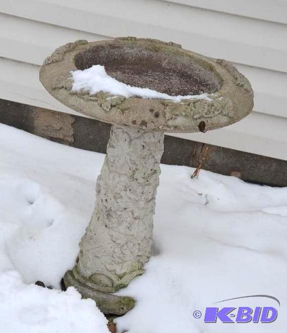lot 256 image: cement birdbath 23" tall. This item may ...