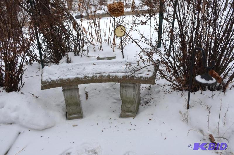 lot 257 image: Ornate cement bench 40" long. This item ...