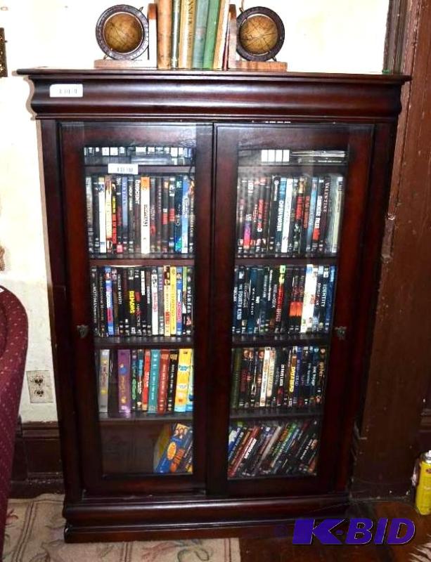 lot 29 image: Wood book case with sliding doors 32x11x49&qu...
