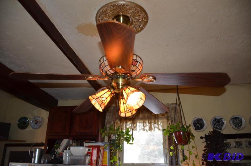 lot 298 image: Ceiling fan with stain glass globes. The ceil...