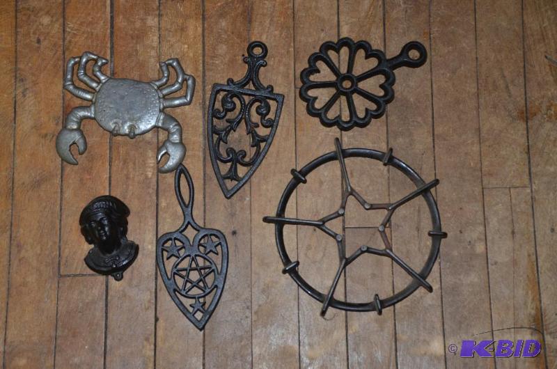 lot 308 image: Cast iron Trivets 9"...
