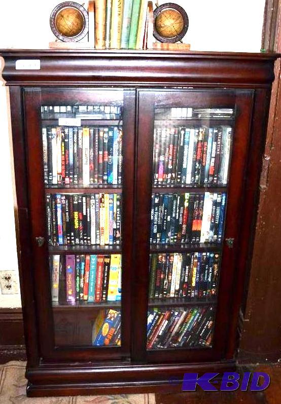 lot 59 image: book case with glass doors 33x48x10". co...