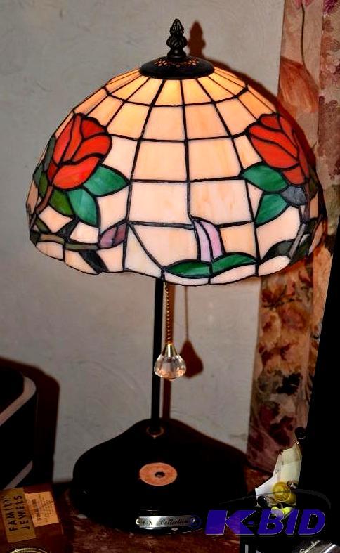 lot 68 image: Stained glass table lamp with rose design...