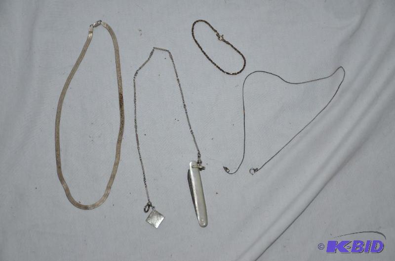 lot 76 image: Pocket knife on chain, bracelet, 2 necklaces,...