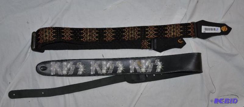 lot 90 image: 2 new guitar straps, one is KISS...
