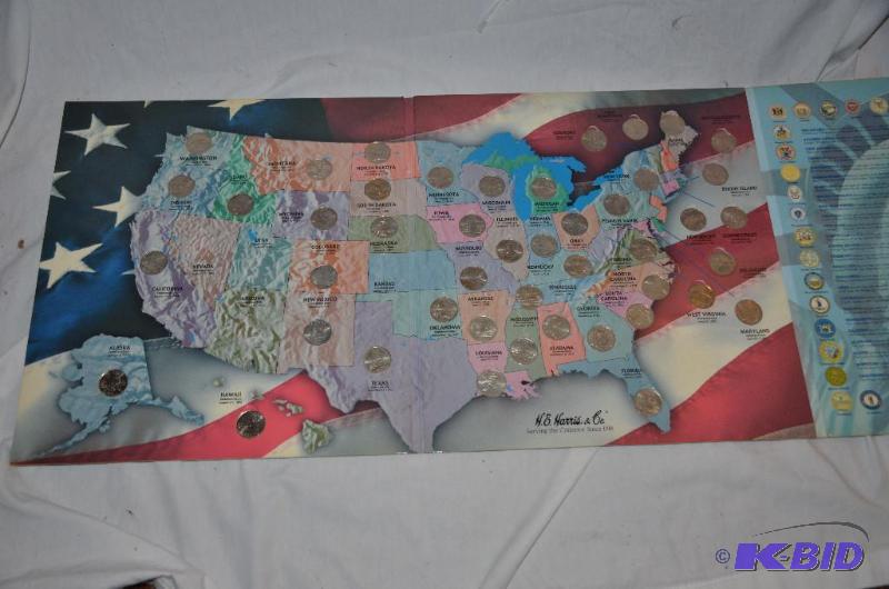lot 92 image: USA Quarter collection book, the book is almo...