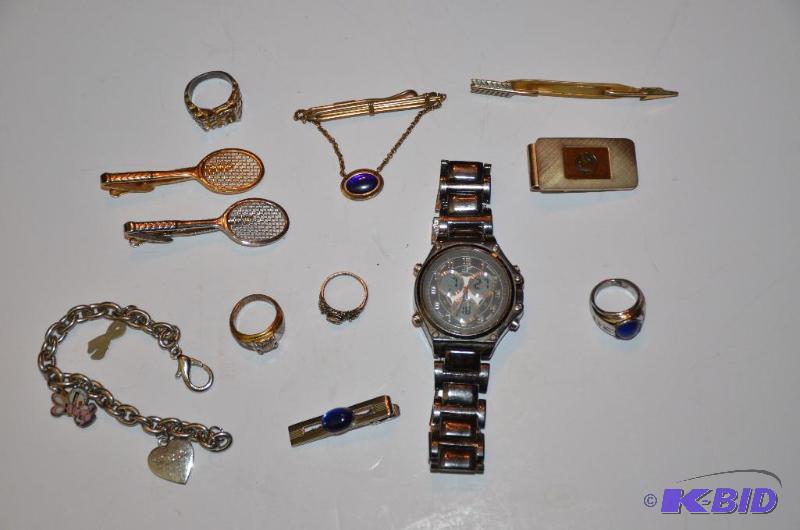 lot 97 image: Jewelry - Rings, tie clasps, watch, charm bra...