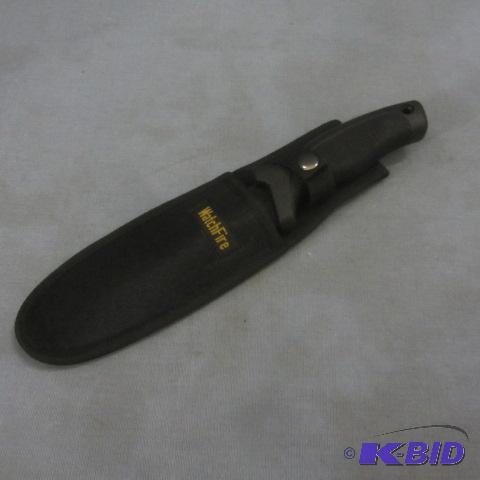 lot 84 image: Watch Fire Sawback Knife