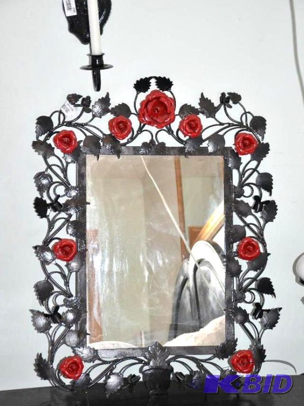 lot 105 image: Wrought iron frame mirror. the frame has red ...