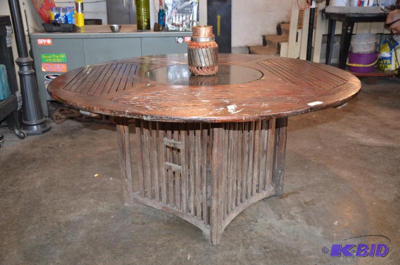 lot 123 image: Wood table with granite lazy Suzan,  60 ...