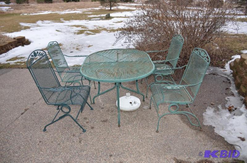 lot 155 image: Metal patio table and 4 chairs 54x38"...