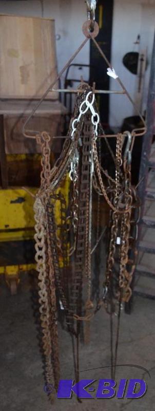 lot 169 image: Industrial wind chime. Chain on a triangle ch...