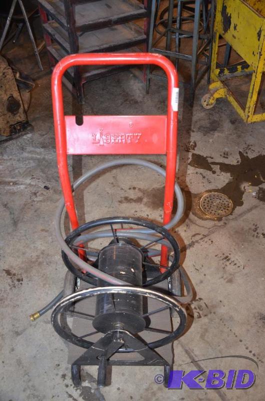 lot 172 image: Vintage Liberty garden hose reel...