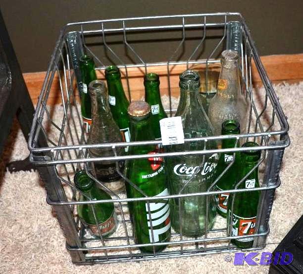 lot 22 image: Vintage metal crate with collectable glass bo...