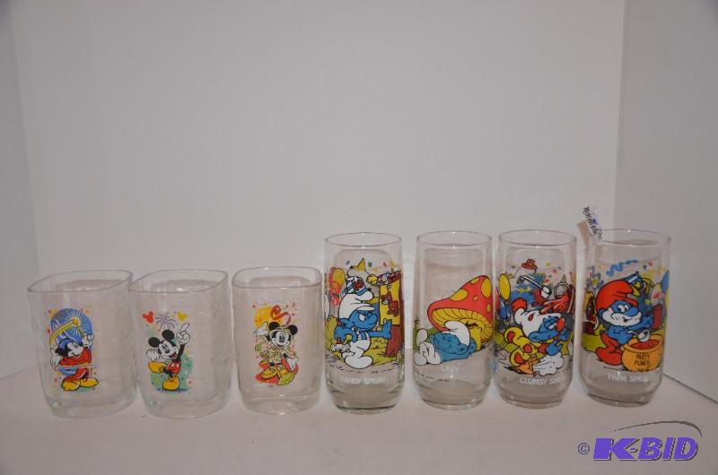 lot 220 image: 4 Smurf glasses, 3 Disney glasses...